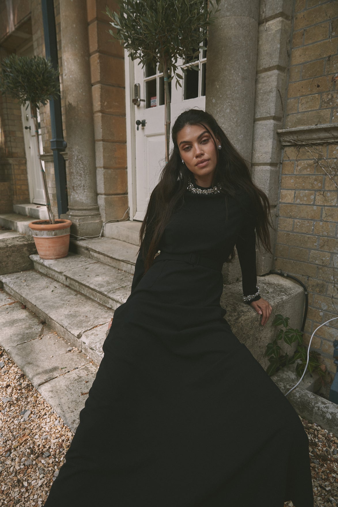 Gown with Stone Embellished Neckline and Feather cuffs