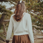 Knit Top with Crochet Flower and Tonal Neck Band Insert