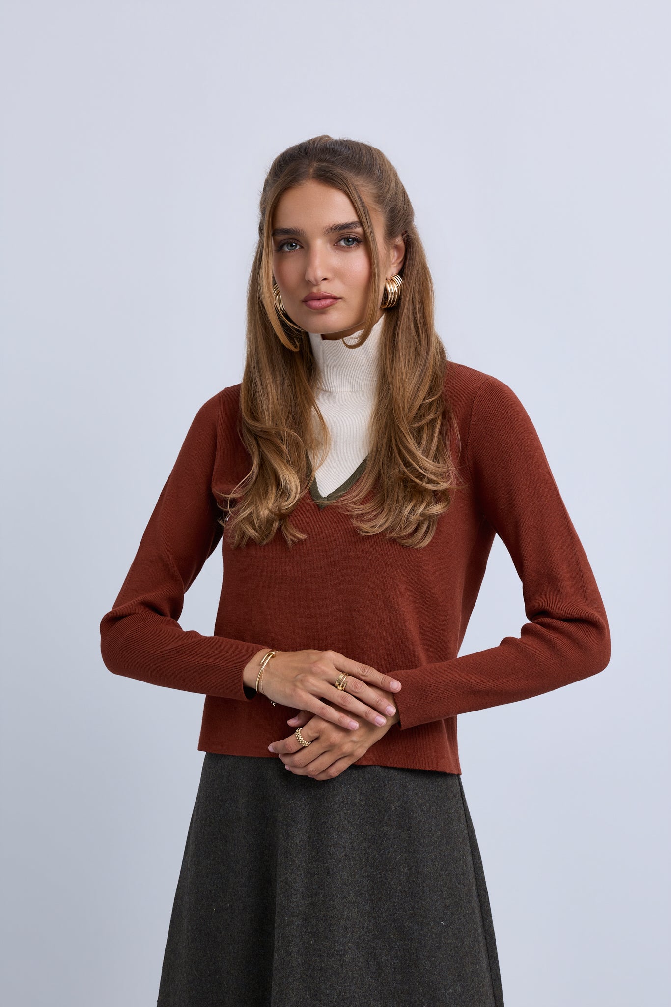 V Neck Design Top With Contrast Piping and High Neck Insert