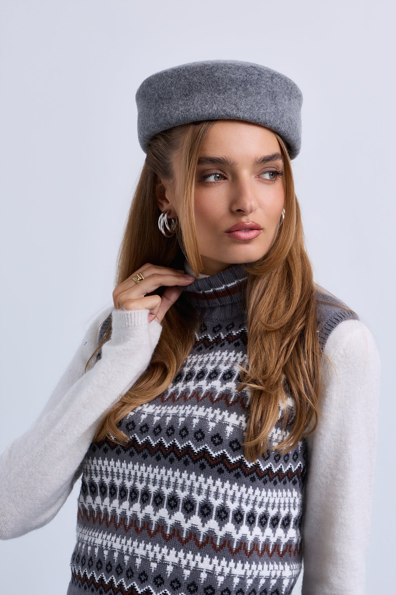 Patterned Knit Sleeveless Roll Neck Top