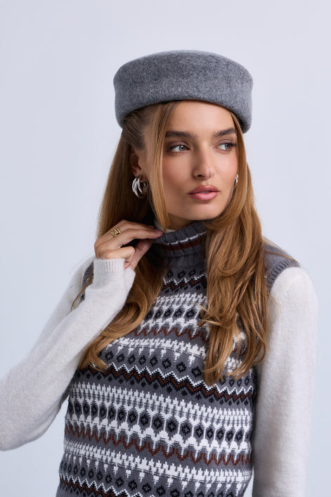 Patterned Knit Sleeveless Roll Neck Top