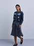 Button Front knit Cardigan with Piping Details and Beaded Flowers