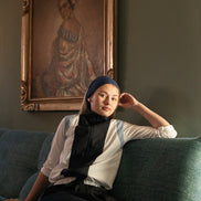 Sleeveless Zip Up Vest with Embossed Tea Logo