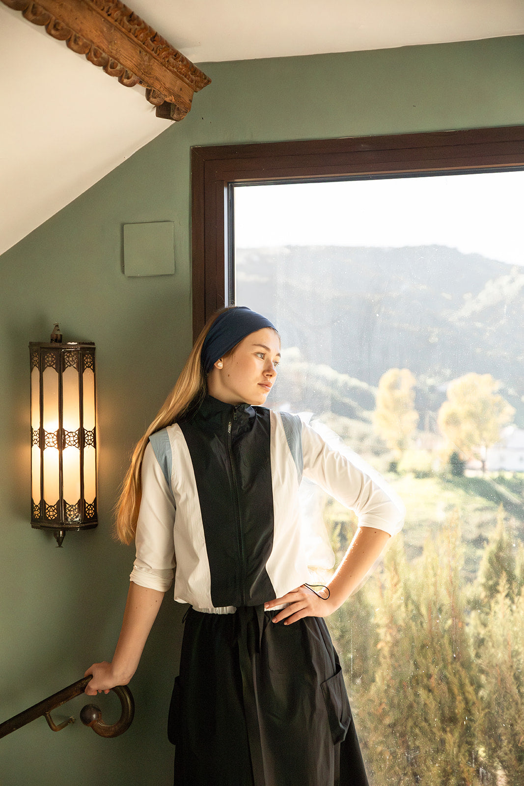 Sleeveless Zip Up Vest with Embossed Tea Logo