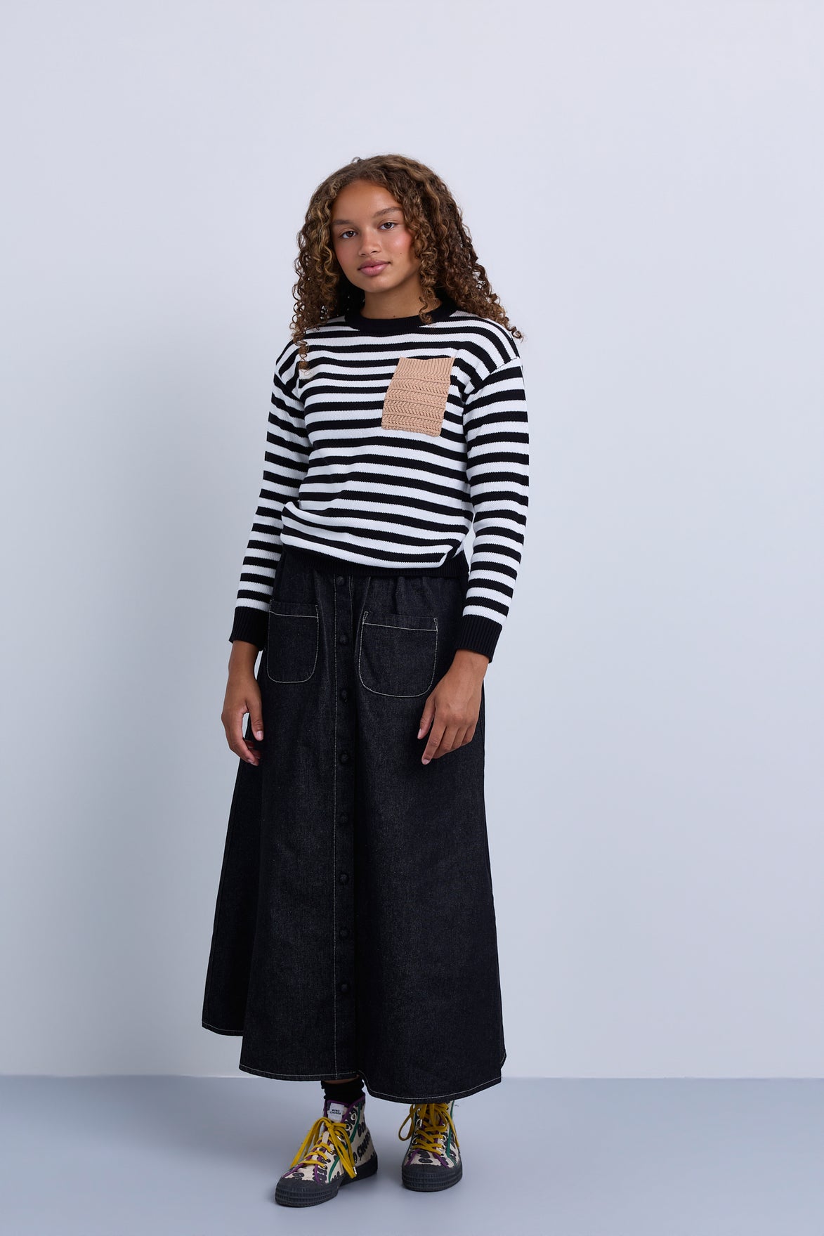 Front button panel denim skirt  with front patch pocket and subtle gathering
