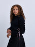 Jersey knit sweater top with tie up sleeve detail