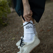 Noir Logo Print Ribbed Cotton Blend Socks