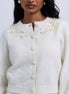 Cropped knit cardigan with floral embellishments