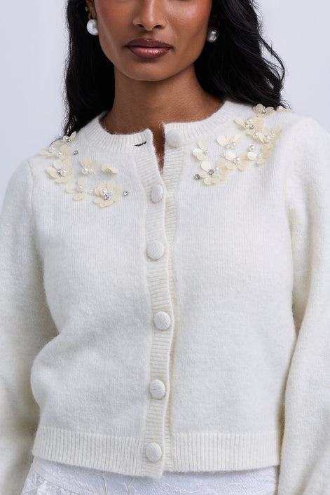 Cropped knit cardigan with floral embellishments