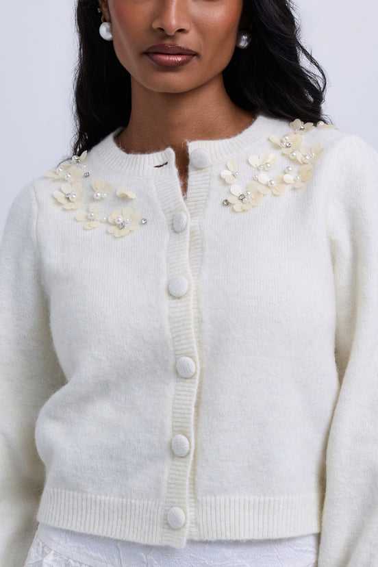 Cropped knit cardigan with floral embellishments